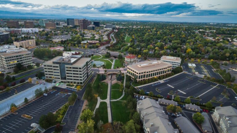 Aerial view of a business park with green spaces in the Denver metro area